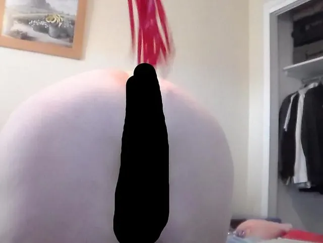 Whipping her ass and pussy