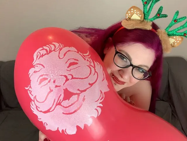 Nackter Ritt auf dem Weihnachtsmann Ballon