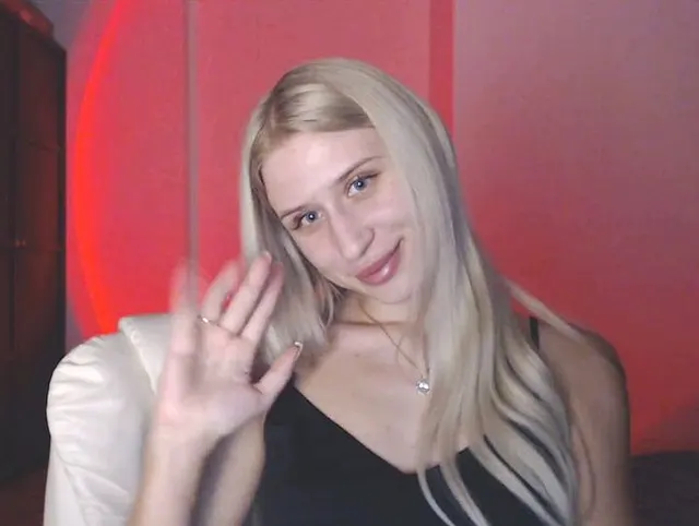 Mein durchsichtiges Nachthemd rutscht herunter und ich befriedige mich unter dem roten Licht.