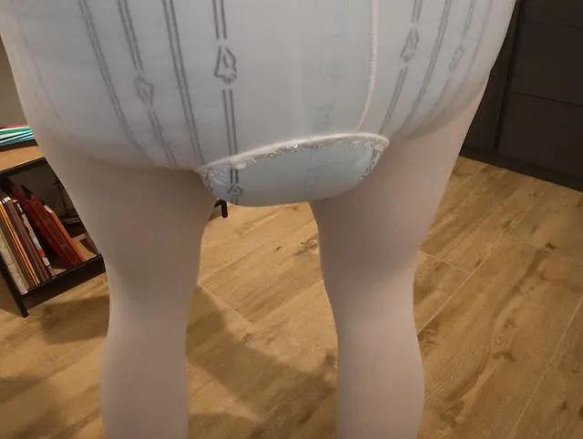 Wearing a diaper and a white pantyhose nylon with a hole. ASMR Diaper Windel 1