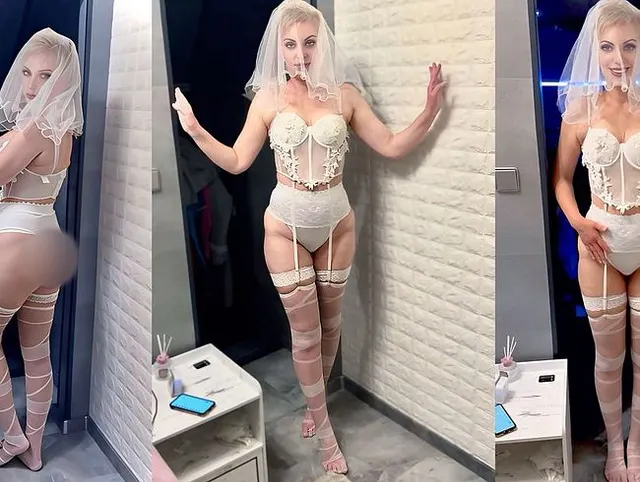 Ehefrau in posiert Hochzeitsdessous