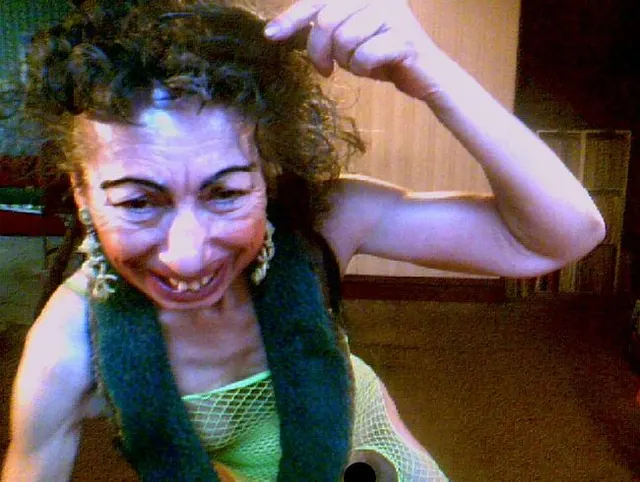 Performing Nude Show In Green Fishet