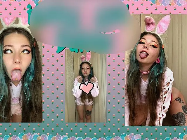 Cute girl dancing in a pink suit with ears.