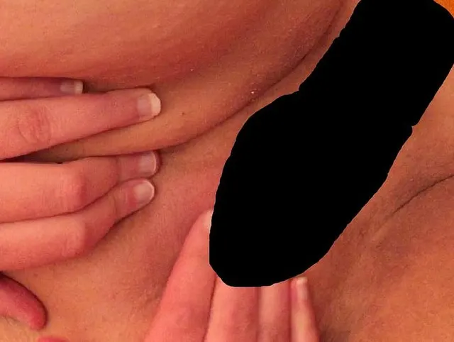 dicke Frau beim Fieber messen