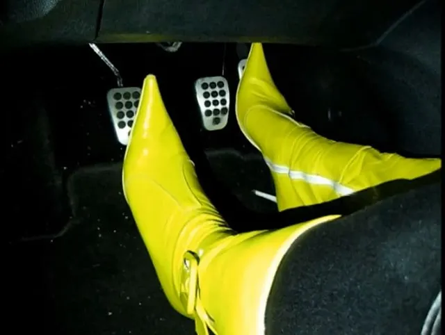 Driving very hard in yellow leather boots