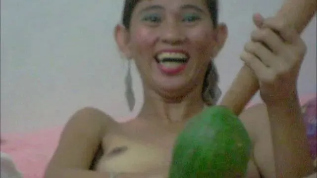 Kerze Papaya und Knüppel