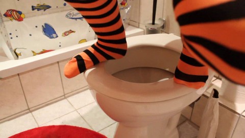 Peeing in pretty orange socks